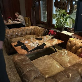 The Gryphon - Comfy littke couch area that we sat at because all the tables were full. It was the perfect spot for us! - New American Near Me - Burlington, Vermont