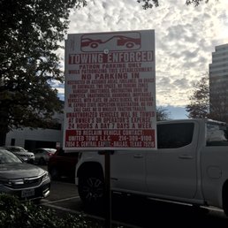 a truck parked in a parking lot a truck parked in a parking lot