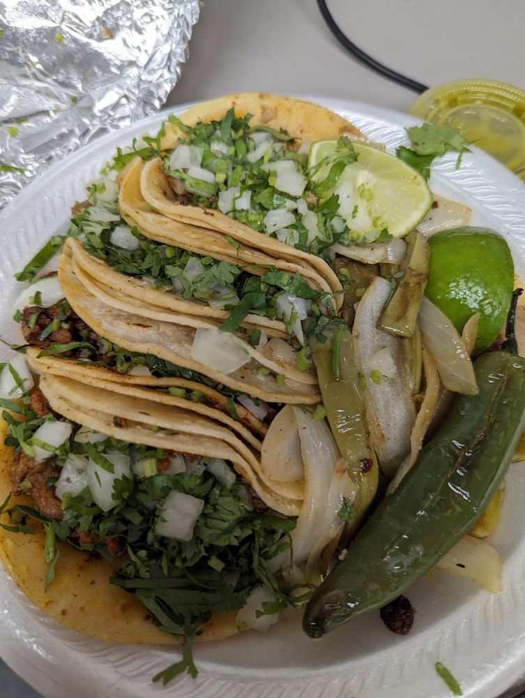 Taqueria El Centenario Logo