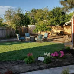 The Garden Girls - San Leandro: drought tolerant sod installation, irrigation, 2 natural flagstone patios and d.g. paths. Backyard. SEE BEFORE PHOTO! !