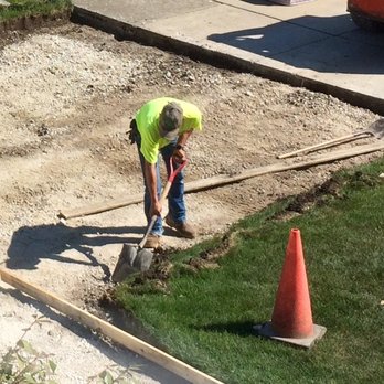 Concrete by Sennstrom - Prepping to install forms. Sod was replaced after driveway was finished - Masonry/Concrete Near Me - Batavia, Illinois