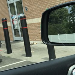 Royal Farms 103 - Trash outside with lone broom.
