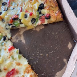 Domino's Pizza - Grease shouldn't wet the box. Vegetarian pizza. Wanted fresh crisp veggies less grease would of been great