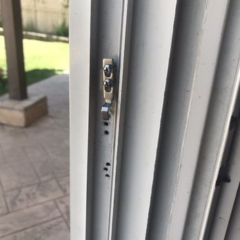 The Screen Lady - This is the three sets of holes he had to drill in order to align the door properly. - Windows Installation Near Me - Carlsbad, California