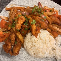 Fried fish of the day Saltado plate Fried fish of the day Saltado plate