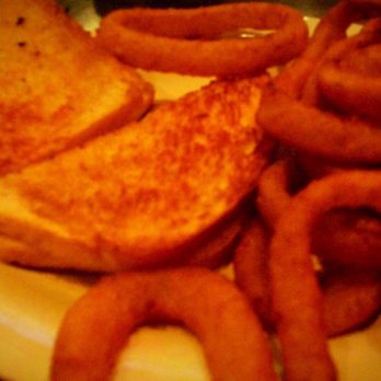 Church Street Tavern - a plate of onion rings and a grilled cheese sandwich - Bars Near Me - Burlington, Vermont Church Street Tavern - a plate of onion rings and a grilled cheese sandwich - Bars Near Me - Burlington, Vermont