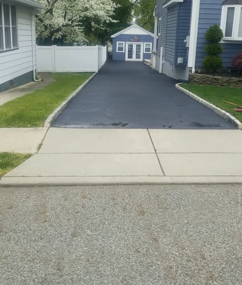 Slide of S&J’s Roofing & Parking Lot Maintenance