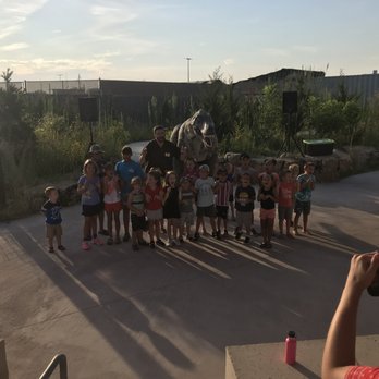 Field Station Dinosaurs - How to put a t-Rex to bed. The presenter was phenomenal! He seemed just as excited as the kids! - Amusement Parks Near Me - Derby, Kansas