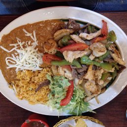 That amazing plate of awesome eats is the mixed fajitas. Tons of food That amazing plate of awesome eats is the mixed fajitas. Tons of food