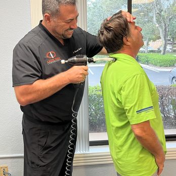 Carpe Diem Chiropractic - Neck adjustment using arthrostim - Chiropractors Near Me - Fort Lauderdale, Florida Carpe Diem Chiropractic - Neck adjustment using arthrostim - Chiropractors Near Me - Fort Lauderdale, Florida