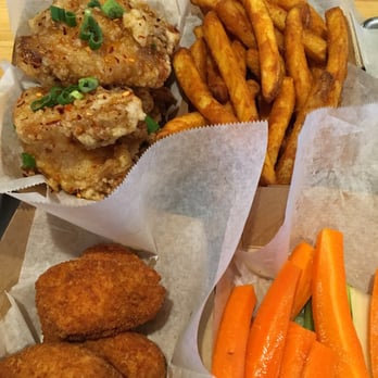 Fire Wings - Clockwise: Saigon street, large fries, veggie sticks and jalapeño poppers - Chicken Wings Near Me - Sacramento, California Fire Wings - Clockwise: Saigon street, large fries, veggie sticks and jalapeño poppers - Chicken Wings Near Me - Sacramento, California