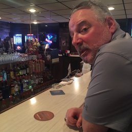 a man sitting at a bar a man sitting at a bar