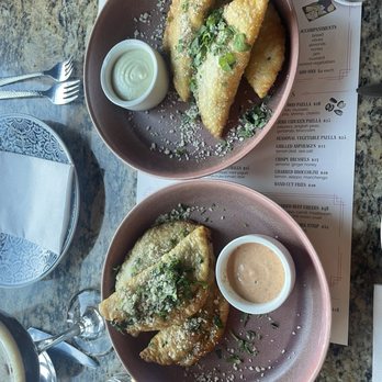 Cafe Americana - Their empanadas. I prefer the jerk chicken over the short rib/beef option, but both were delicious. - Tapas/Small Plates Near Me - Arlington, Texas