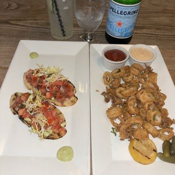 Junior Restaurant  - Prosciutto bruschetta, as well as calamari with s.pellegrino sparkling water - Lounges Near Me - Roseville, California