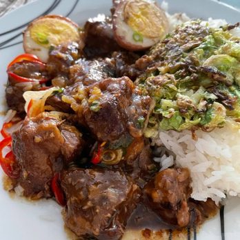 Taurus Ox - Thom Keim - highly recommend! Braised & caramelized Pork belly with a soy-cured, hard-cooked egg, fresno chile, and brussel hash. - Laotian Near Me - Seattle, Washington