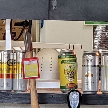Yelp Elite Week With Blacktop Grill - a counter with beer cans and a clock - Local Flavor Near Me - Tucson, Arizona Yelp Elite Week With Blacktop Grill - a counter with beer cans and a clock - Local Flavor Near Me - Tucson, Arizona