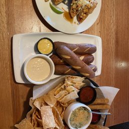 Chicken Wonton Tacos, Brew Pub Pretzels & Beer Cheese Dip, appetizer platter Chicken Wonton Tacos, Brew Pub Pretzels & Beer Cheese Dip, appetizer platter