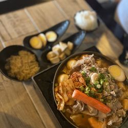 Hi Pot Miami - Kimchi hotpot soup, side of instant noodle, fish tofu and eggs