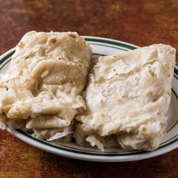 Coconut Palm Bar & Grill - a plate of food - Caribbean Near Me - Bronx, New York