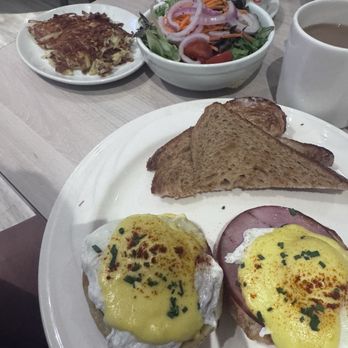 America - Eggs Benedict with mixed greens - New American Near Me - Las Vegas, Nevada