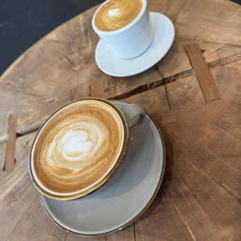 Sawdust Coffee - Blueberry Vanilla Latte with house made syrups, and a Cortado - Coffee & Tea Near Me - Greenville, South Carolina Sawdust Coffee - Blueberry Vanilla Latte with house made syrups, and a Cortado - Coffee & Tea Near Me - Greenville, South Carolina