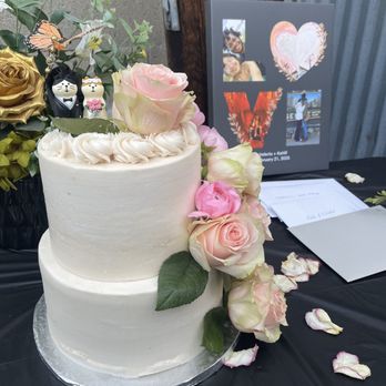 Cupcakin' Bake Shop - Beautiful and delicious vegan chocolate wedding cake with white frosting - Cupcakes Near Me - Oakland, California Cupcakin' Bake Shop - Beautiful and delicious vegan chocolate wedding cake with white frosting - Cupcakes Near Me - Oakland, California