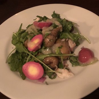Wren - Salad of potato confit, pickled quail eggs, smoked walleye, and arugula. Yum! - New American Near Me - Suttons Bay, Michigan