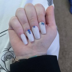 Beautiful Nails - This is what I got . I asked for them to be longer so they are a little longer than the picture but still so cute