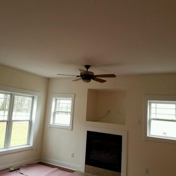 Juan De Dios Painting - a living room with a ceiling fan - Painters Near Me - Frankford, Delaware Juan De Dios Painting - a living room with a ceiling fan - Painters Near Me - Frankford, Delaware