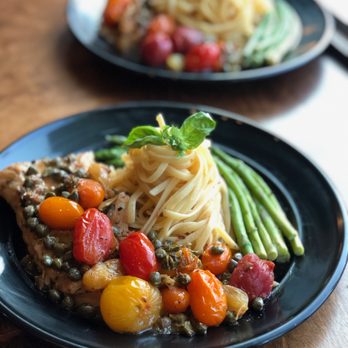 Chef Derricka - Pan-Seared Cod in Sauvignon Blanc Heirloom Tomato Caper Basil Sauce w/ Linguine tossed in White Truffle Oil - Caterers Near Me Chef Derricka - Pan-Seared Cod in Sauvignon Blanc Heirloom Tomato Caper Basil Sauce w/ Linguine tossed in White Truffle Oil - Caterers Near Me