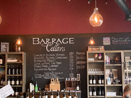 Photo of Barrage Cellars - Woodinville, WA, US. a blackboard with a list of wines