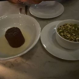 Toffee pudding with brandied custard and Chocolate budino with pistachio Toffee pudding with brandied custard and Chocolate budino with pistachio