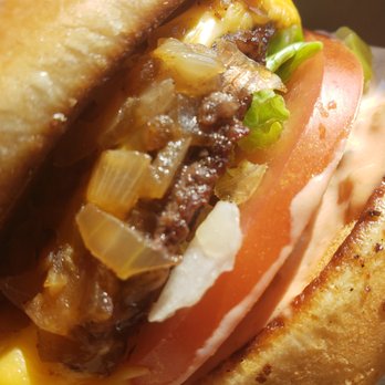 In-N-Out Burger - cheeseburger animal style closeup. - Fast Food Near Me - Tempe, Arizona In-N-Out Burger - cheeseburger animal style closeup. - Fast Food Near Me - Tempe, Arizona