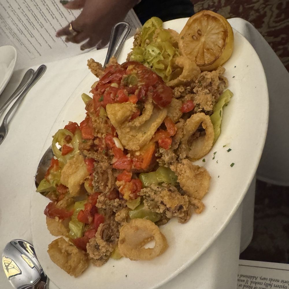 The Capital Grille - Pan-Fried Calamari with Hot Cherry Peppers - Steakhouses Near Me - Indianapolis, Indiana The Capital Grille - Pan-Fried Calamari with Hot Cherry Peppers - Steakhouses Near Me - Indianapolis, Indiana