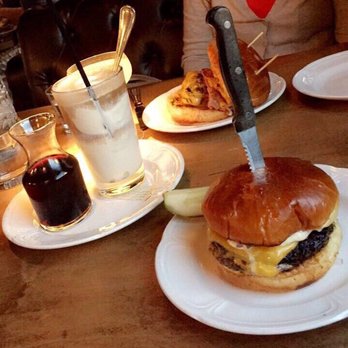 Au Cheval - Burger in the front. Bologna sandwich in the back. Root beer float on the left. All amazing!!!! - Bars Near Me - Chicago, Illinois Au Cheval - Burger in the front. Bologna sandwich in the back. Root beer float on the left. All amazing!!!! - Bars Near Me - Chicago, Illinois