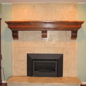 All Pro Chimney - After; Travertine tiles and the Regency U32 gas insert is installed. - Fireplace Services Near Me - Rockville, Maryland All Pro Chimney - After; Travertine tiles and the Regency U32 gas insert is installed. - Fireplace Services Near Me - Rockville, Maryland