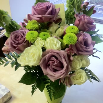 Peachtree Petals - Lovely Lavender Bouquet - lavender roses, alstroemeria, white spray roses, bells of Ireland, green frosted vase. Photo by Vyvy. - Florists Near Me - Atlanta, Georgia Peachtree Petals - Lovely Lavender Bouquet - lavender roses, alstroemeria, white spray roses, bells of Ireland, green frosted vase. Photo by Vyvy. - Florists Near Me - Atlanta, Georgia
