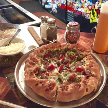Hernando's Pizza Pub - Pesto 10" pizza $13 dipped in honey is lovely - Pizza Near Me - Winter Park, Colorado