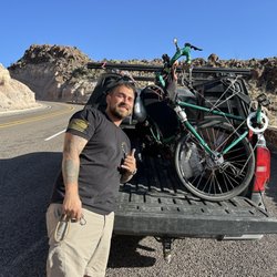 El Dorado - Exterior: Army vet Michael posing with my "FrankenBike", newly-stuffed into the bed of husband pickup
