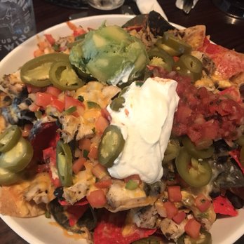 Great Dane Pub & Brewing - Large nachos with chicken - American Near Me - Madison, Wisconsin Great Dane Pub & Brewing - Large nachos with chicken - American Near Me - Madison, Wisconsin