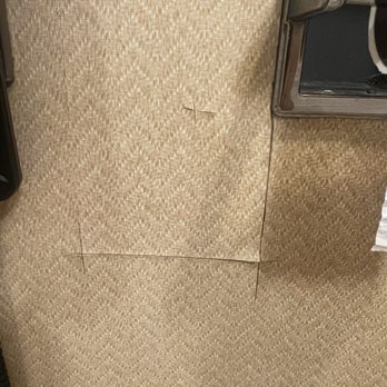 Courtyard by Marriott Canton - Random cuts in the wallpaper in our bathroom - Hotels Near Me - North Canton, Ohio