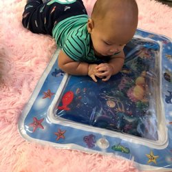 Mi Neighborhood Playhouse Too - My son playing.