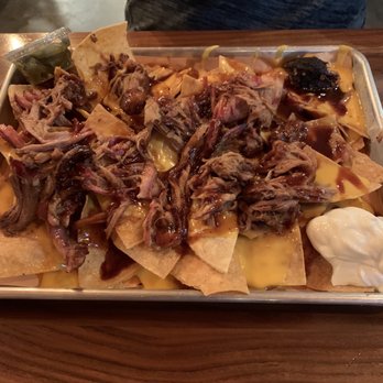 Hog Tide Bar-B-Que - BBQ nachos with pulled pork. - Barbeque Near Me - Aurora, Missouri Hog Tide Bar-B-Que - BBQ nachos with pulled pork. - Barbeque Near Me - Aurora, Missouri