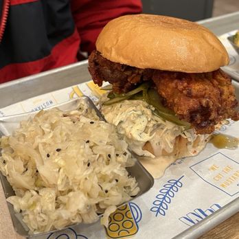 Wursthall - Kenjis Korean chicken burger and sesame bacon sauerkraut. - German Near Me - San Mateo, California