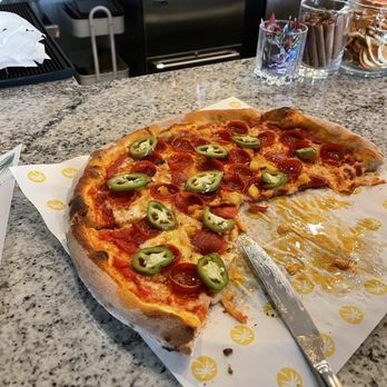 Pau Hana - Kai pizza.  A loaded pepperoni pizza with pickled fresh jalapeños and some charred pineapple (needed more) - Hawaiian Near Me - Savage, Minnesota