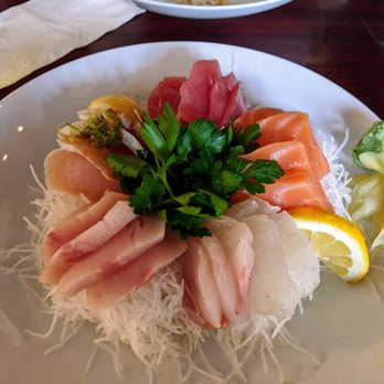 Blue Fin Sushi - a plate of food on a table - Sushi Bars Near Me - Bellingham, Washington Blue Fin Sushi - a plate of food on a table - Sushi Bars Near Me - Bellingham, Washington