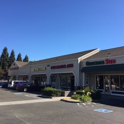 Yee's Martial Arts Academy - Next to a few other businesses, store front.