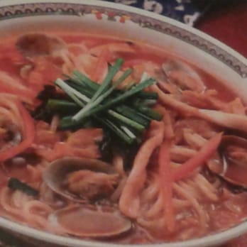 Cham Cham Korean BBQ - Picture on wall for SPICY SEAFOOD NOODLES - Korean Near Me - Hilo, Hawaii
