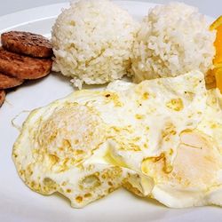 Sam Sato's - Classic breakfast selected w/over easy eggs, steamed rice & Portuguese sausage (8/29/25)