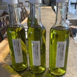 San Miguel Olive Farm - Samples from the first three barrels of oil off to the chemist.